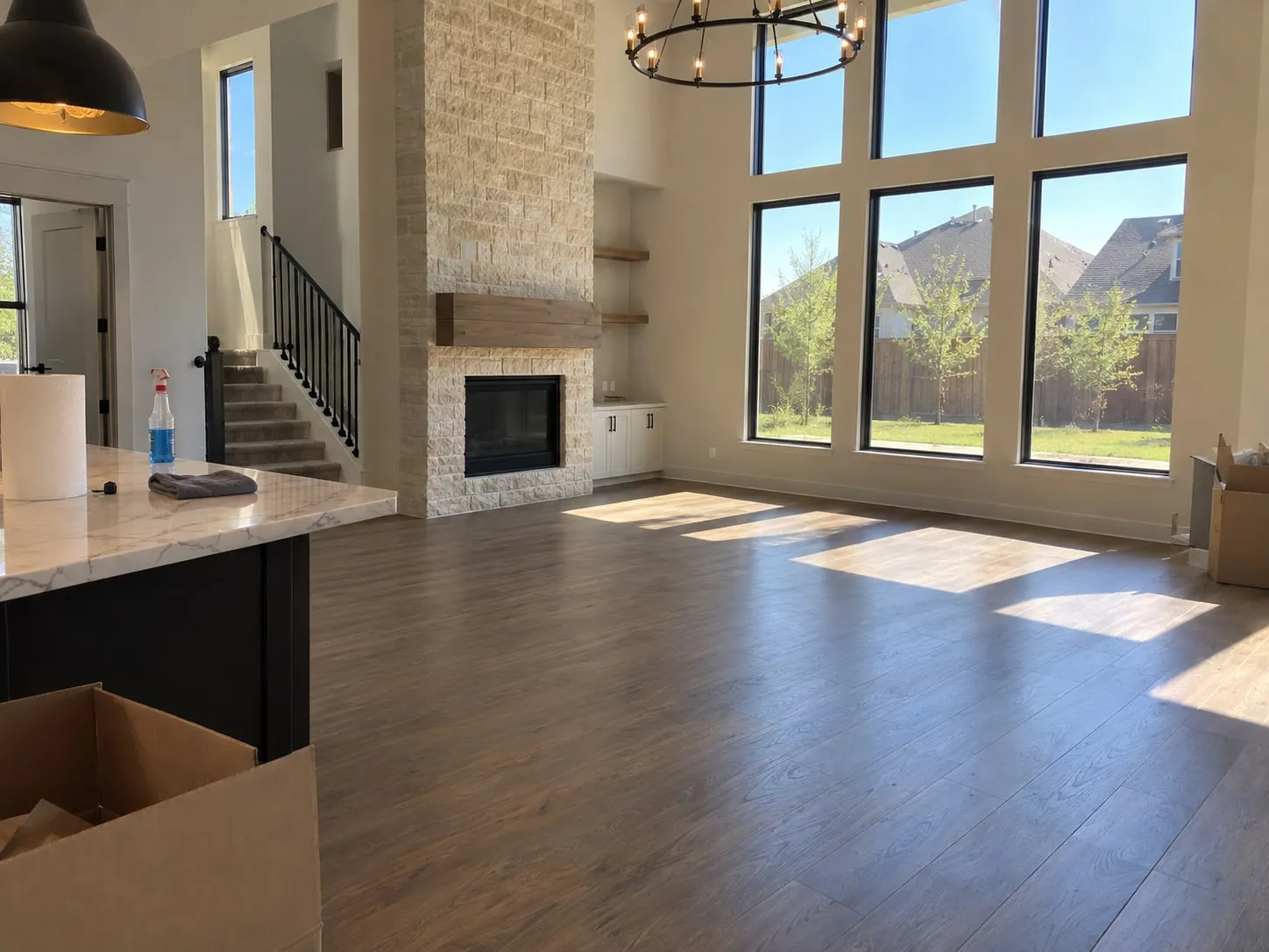 Cleaner mopping floors in an empty home during a move-out cleaning in McKinney, TX